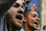 People shout anti-government slogans in Cairo