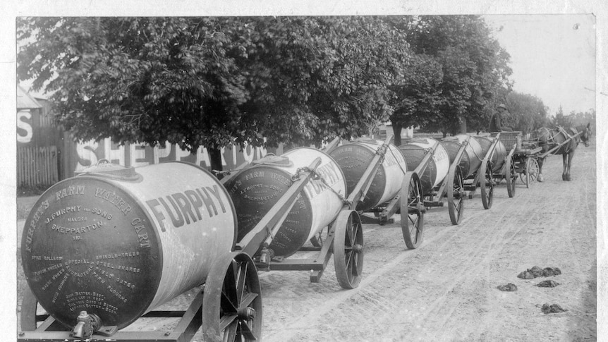 A line of furphy water carts