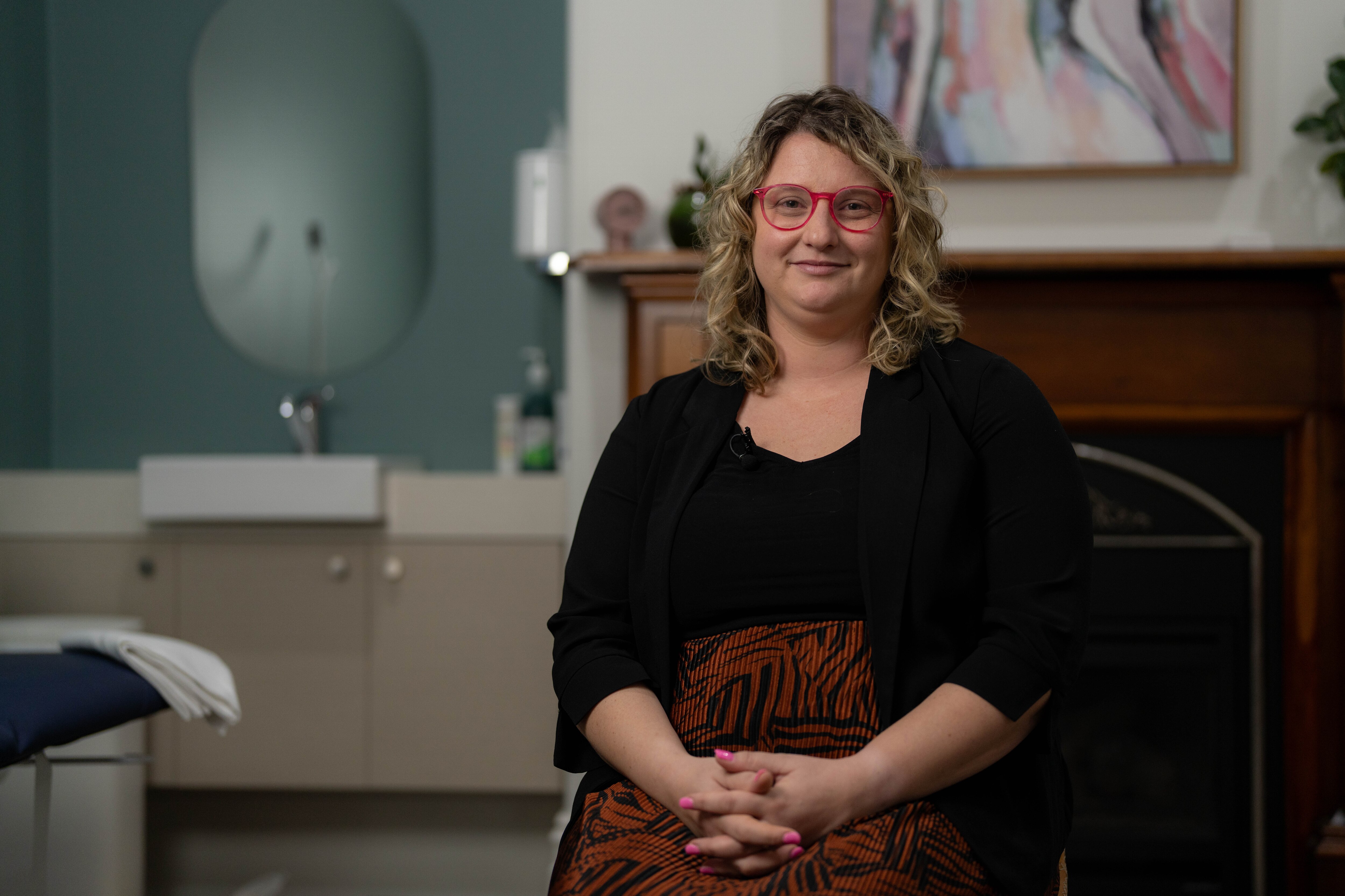 Woman smiles for photo