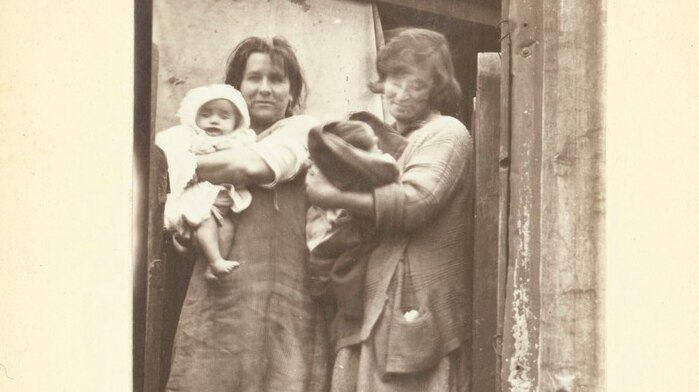 Sepia-toned historical photo shows two mothers living in Calrton in the 1930s.