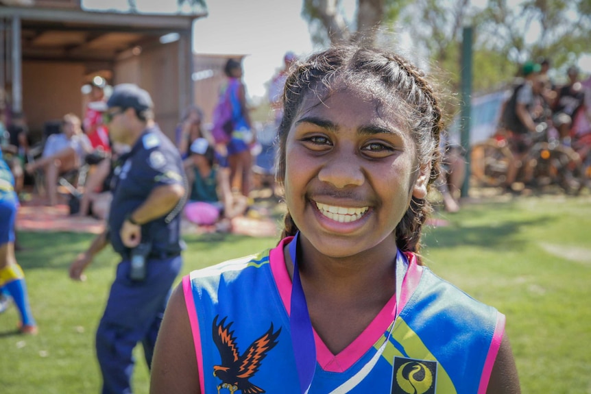 Sanchez Augustine after the Looma Eagles AFL grand final match