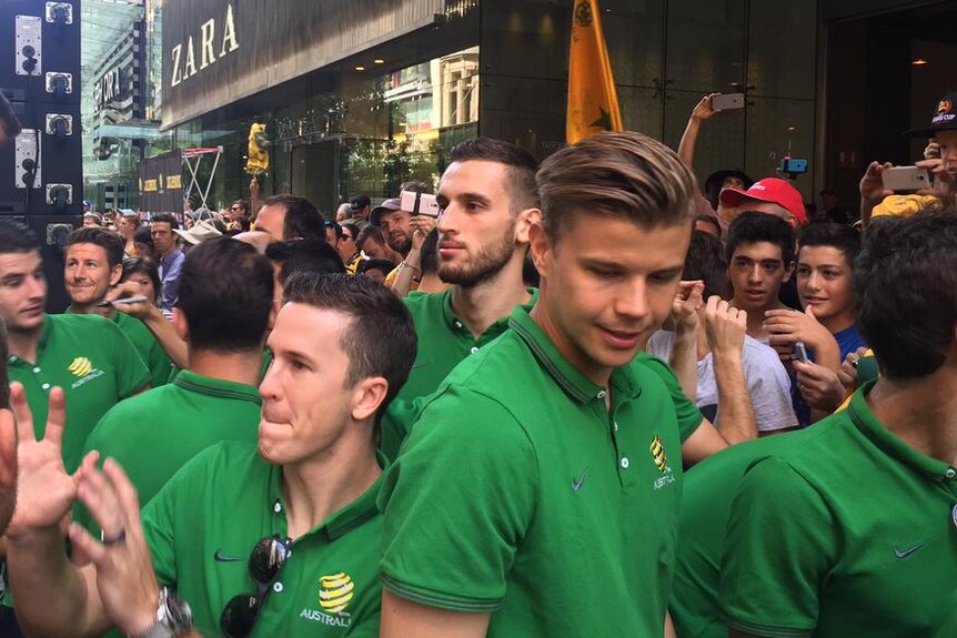 Socceroos are surrounded by fans in Sydney
