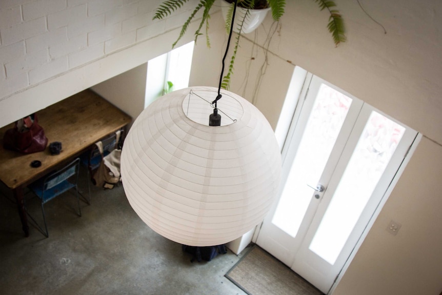 The double height ceiling in the tiny apartment