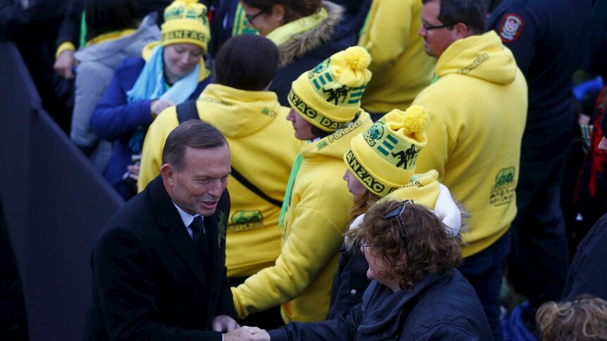 Tony Abbott greets pilgrims at Anzac Cove