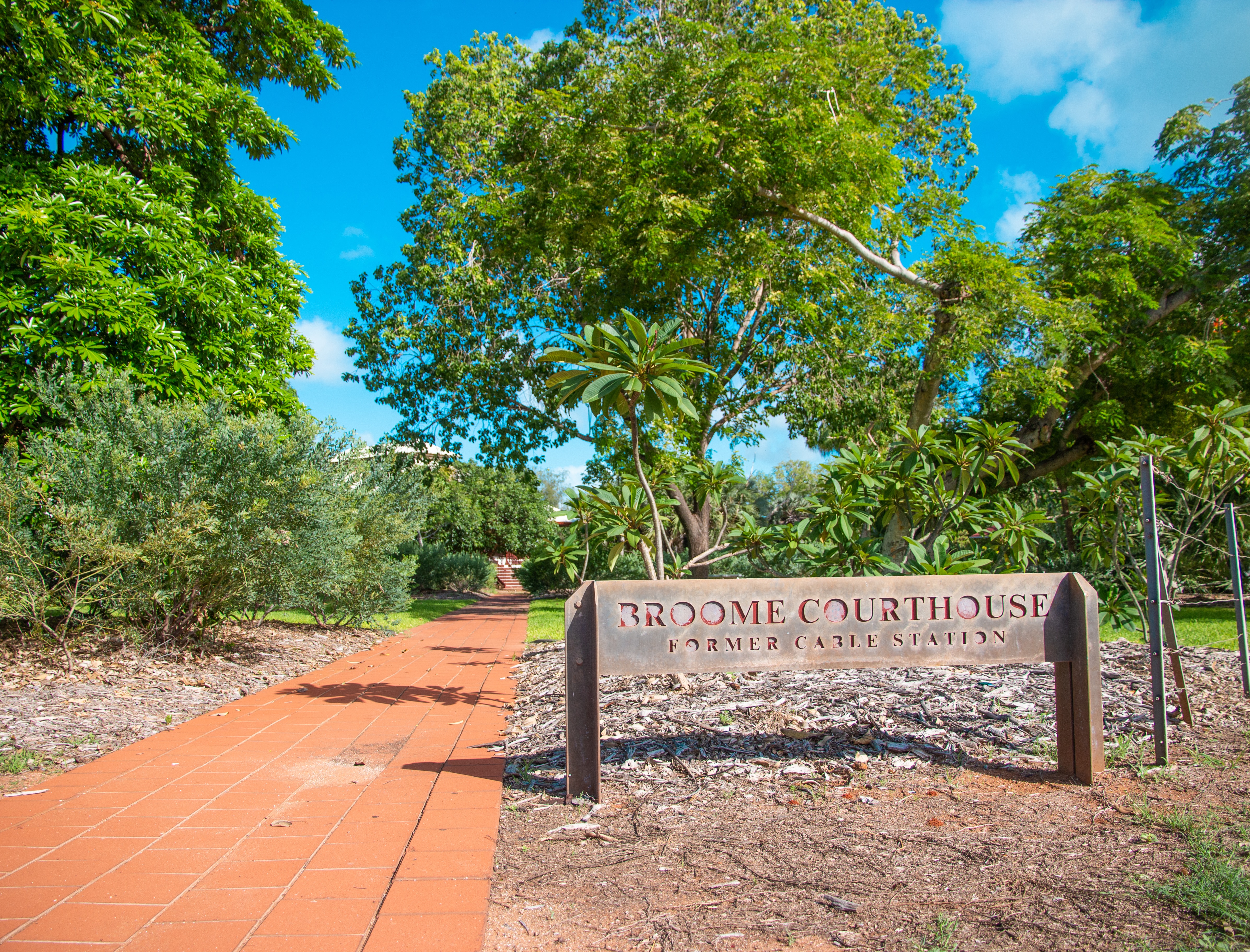 A sign outside the Broome Courthouse.