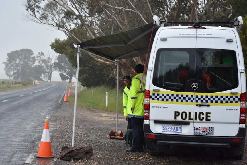 Police at a border checkpoint on the Limestone Coast