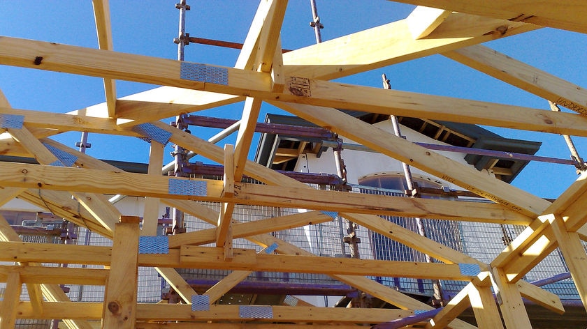 The timber frame of a house under construction