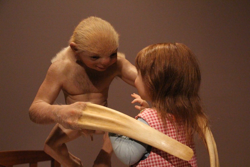 Patricia Piccinini's artwork, titled  'the Welcome Guest, is on display at the National Gallery of Australia.