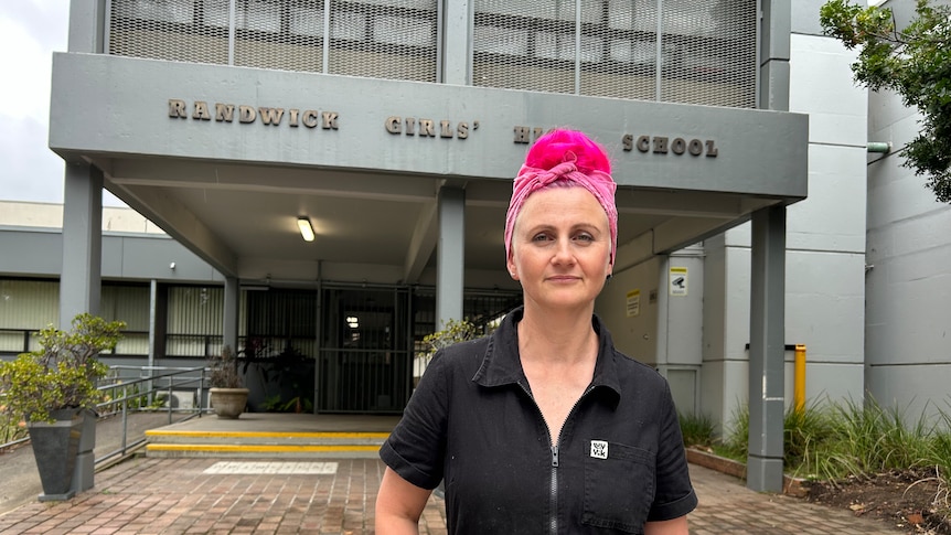 mother lucy bloom standing outside randwick girls high school looking at the camera