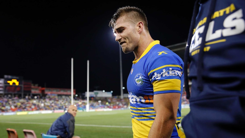 Parramatta's Kieran Foran leaves the field with an injury against Newcastle in May 2016.
