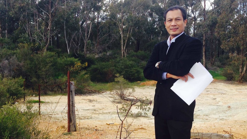 Heri Febriyanto from the Bendigo Islamic Association standing in front of the proposed mosque site