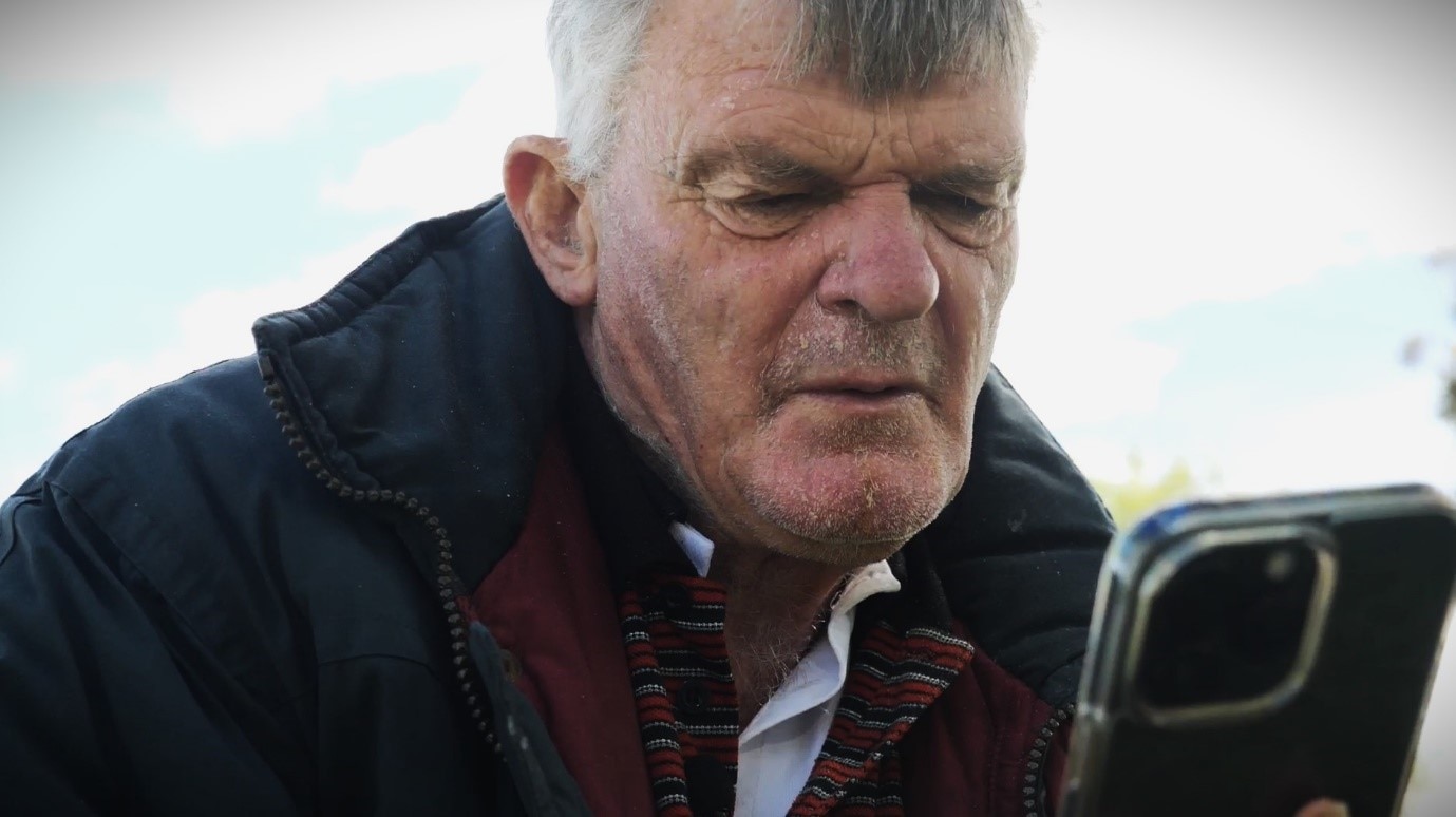 Man looks at his phone 