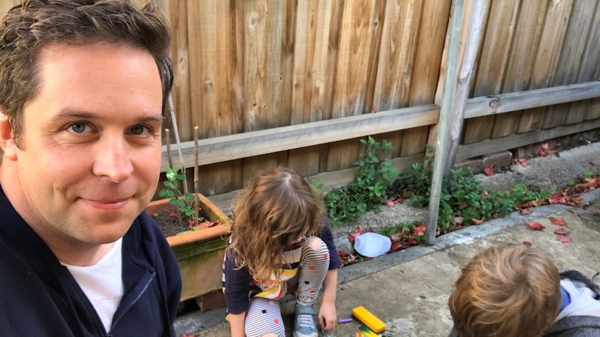 A selfie by Dr Hunter Mulcare shows him smiling with his two primary school-aged kids to depict homeschooling during coronavirus