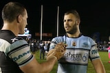 Cronulla's Wade Graham (R) is congratulated by team-mate Paul Gallen after being named for NSW.