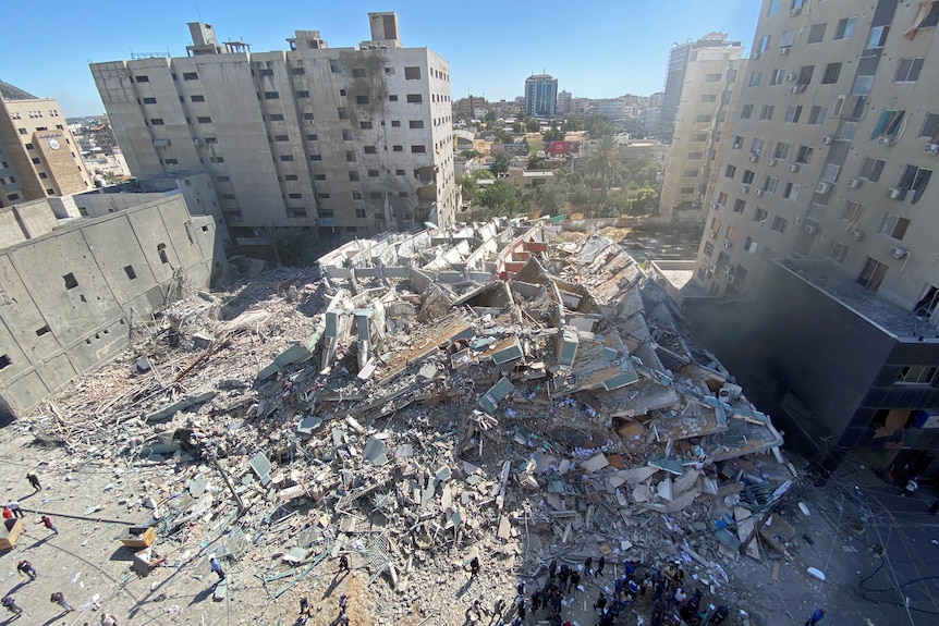 Rubble from a tower housing media targeted by the Israeli military