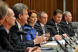 Gillard listens to state premiers at COAG