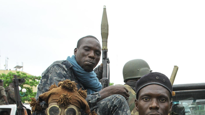 Pro-Ouattara fighters prepare for the so-called "final assault" in Abidjan