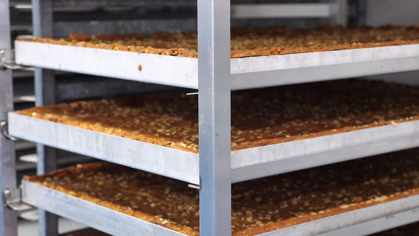 Cakes are made in bulk batches at Early Rise Baking Company, in Dubbo.