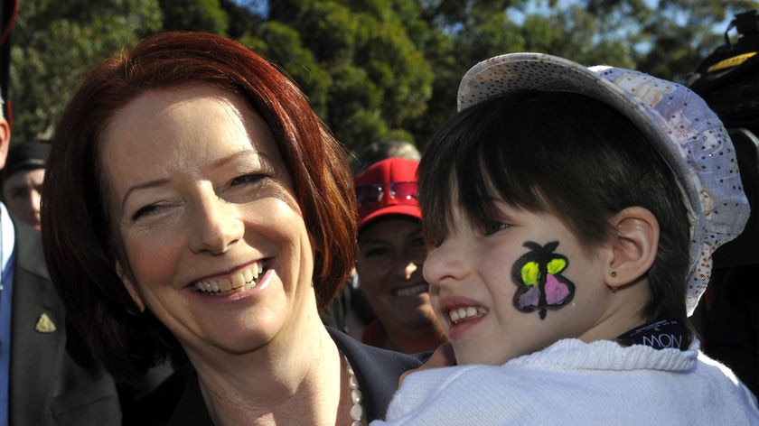 Julia Gillard holds four year old