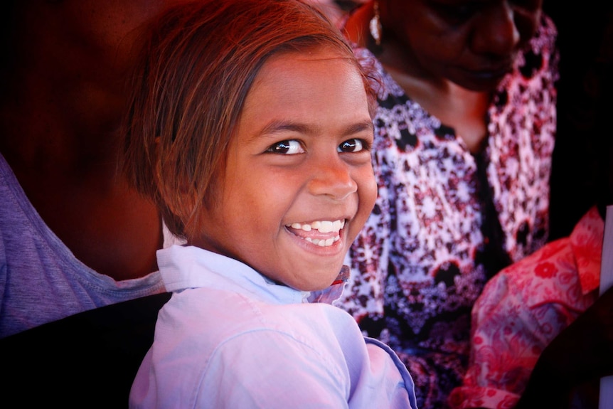 An Aboriginal child pictured at the Kenbi land hand back.