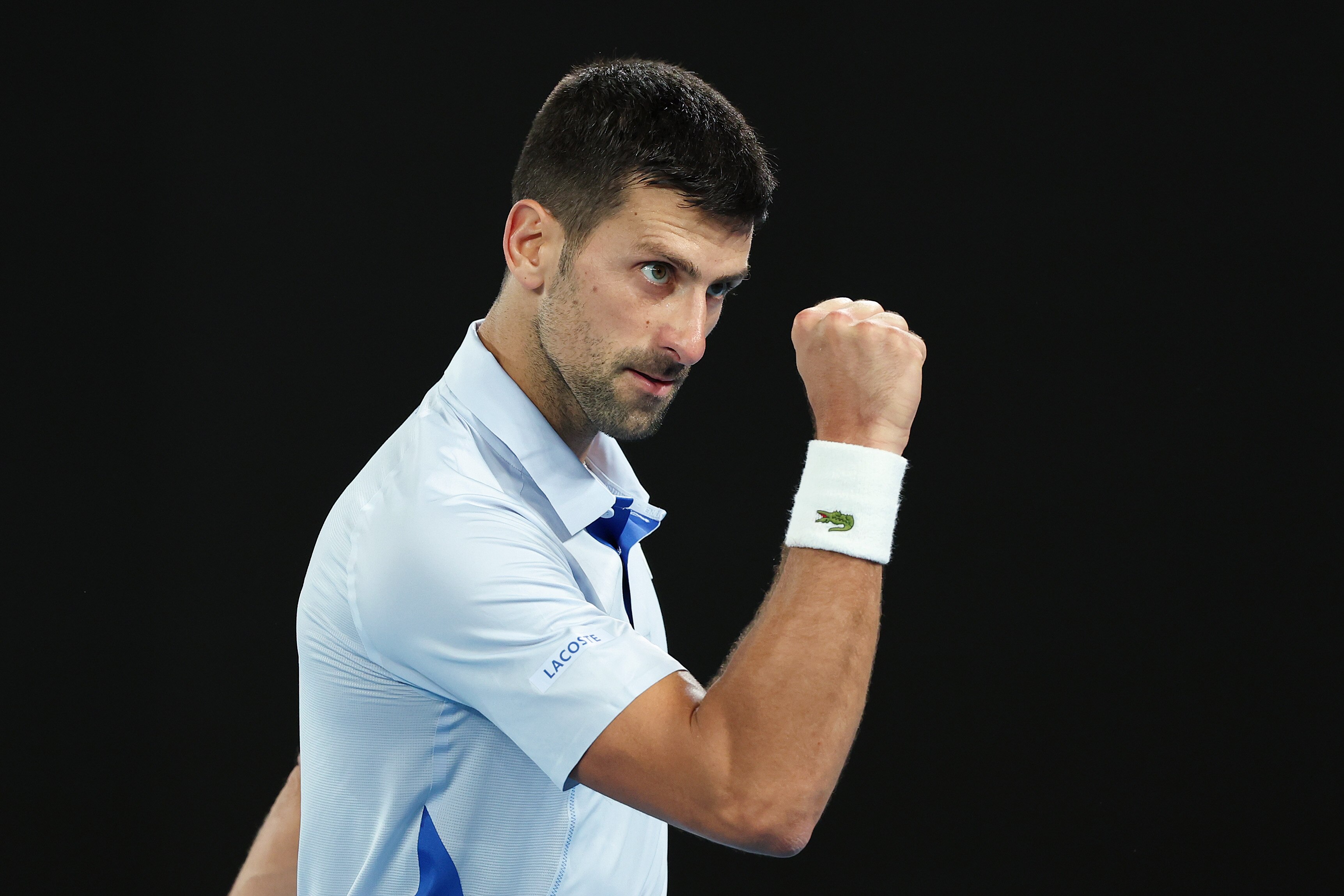 Novak Djokovic pumps his right fist at the 2024 Australian Open.