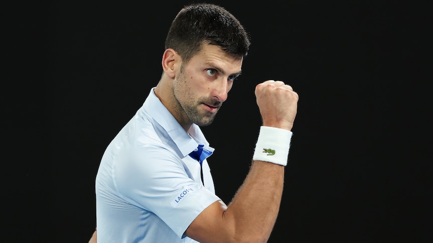 Novak Djokovic pumps his right fist at the 2024 Australian Open.
