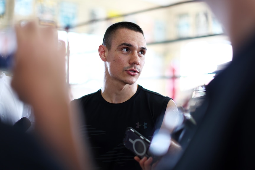 Tim Tszyu looks to one side