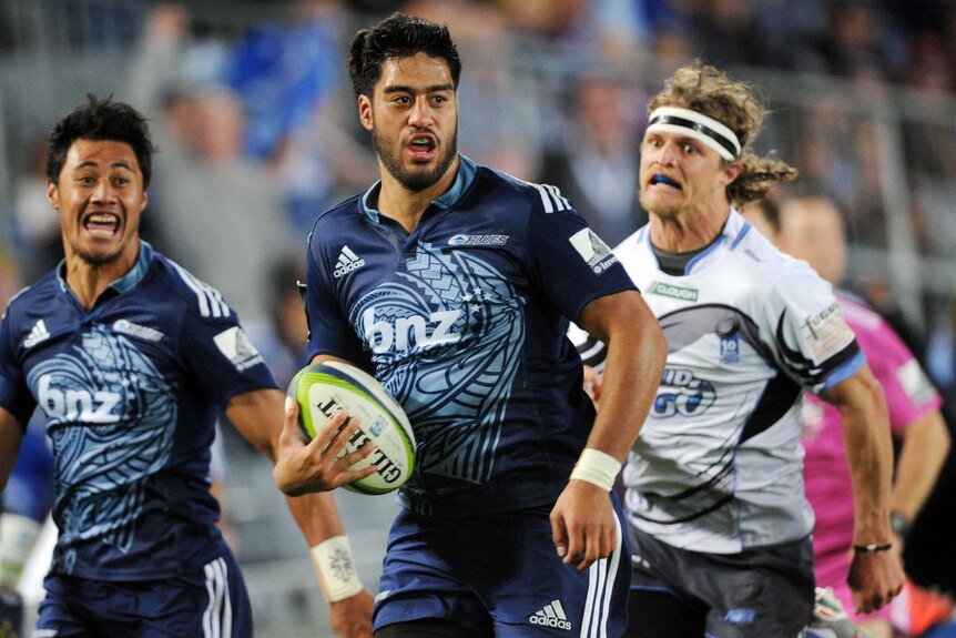 Blues flanker Akira Ioane heads for the tryline