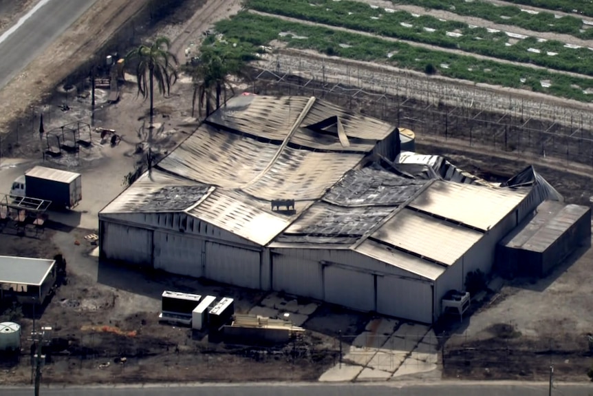 An aerial photo of a shed destroyed by fire