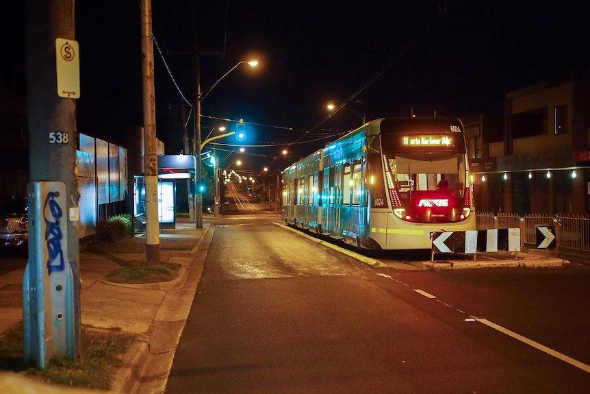 Tram in Melbourne lockdown at night.