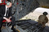 US Defense Secretary James Mattis looks out over Kabul as he arrives via helicopter.
