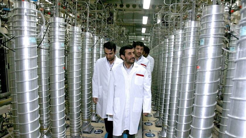 Iranian President Mahmoud Ahmadinejad tours a nuclear facility in Natanz