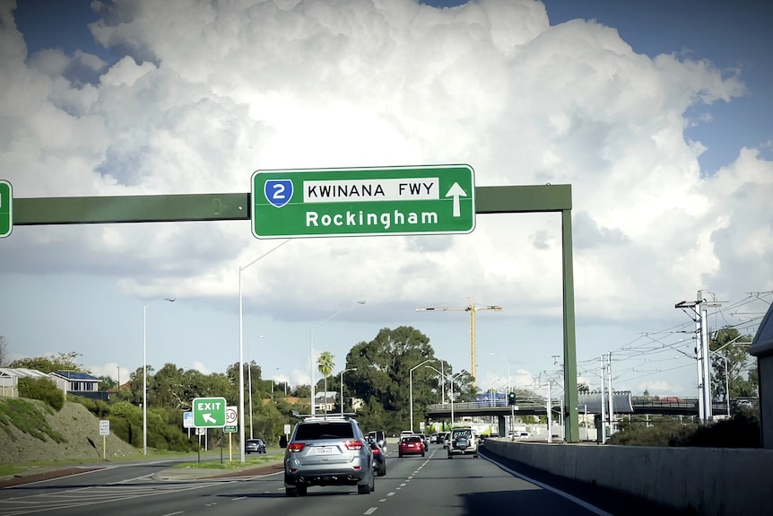A directional sign pointing to Rockingham on Perth's Kwinana Freeway