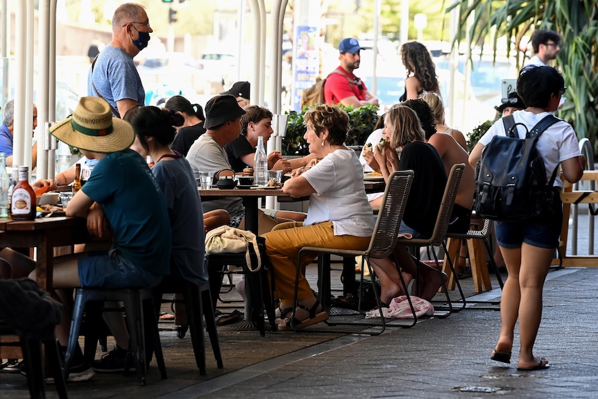 People sitting outdoors at a cafe