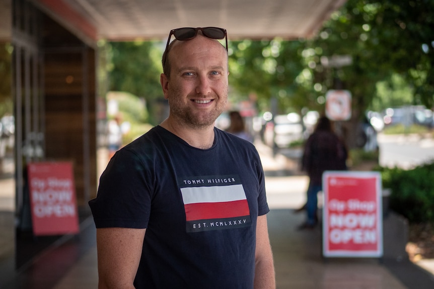 A man stands in the main street of Toowoomba