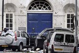 Damaged cars in Tavistock Square, London after several blasts hit