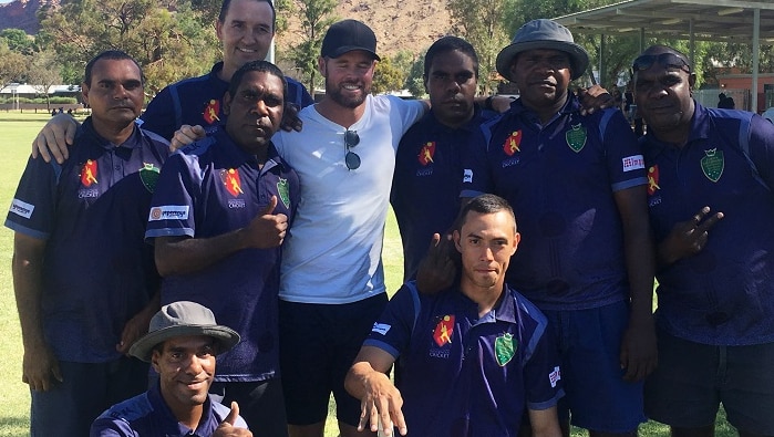 The Alice Springs Correctional Centre 'Eagles' pose for a team shot at the Indigenous Cricket Carnival