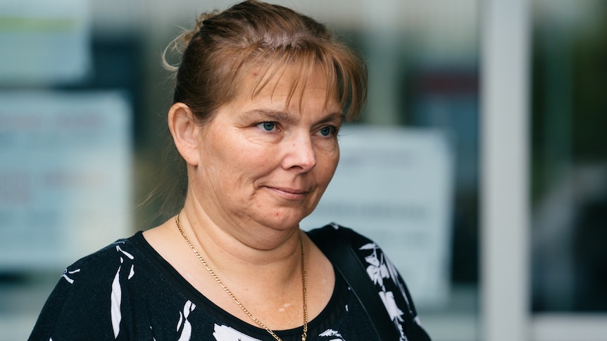 Michelle Hanson walks out of a Perth court.