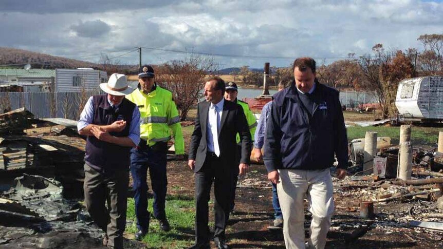 Federal Opposition Leader Tony Abbott tours fire-hit Tasmanian town of Dunalley.