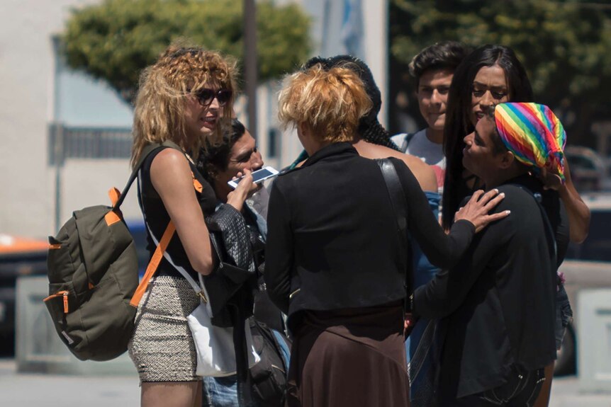 Roxana Hernandez is seen talking to her friends.