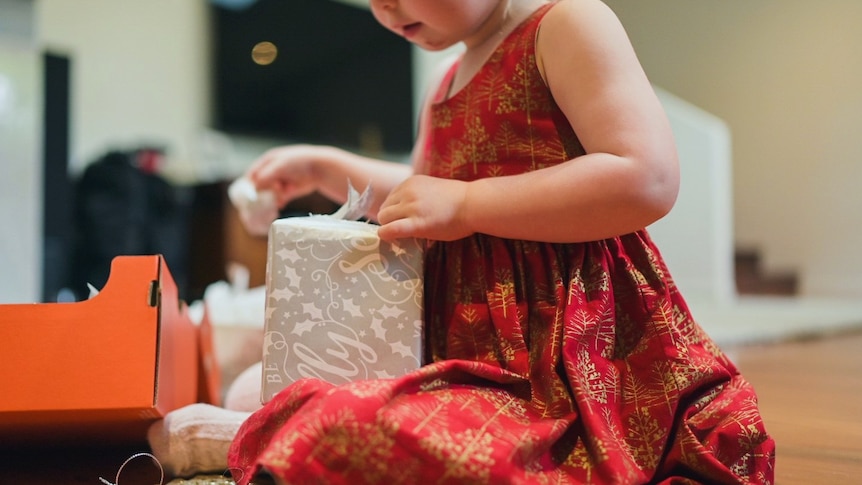 Opening presents on Christmas Day.