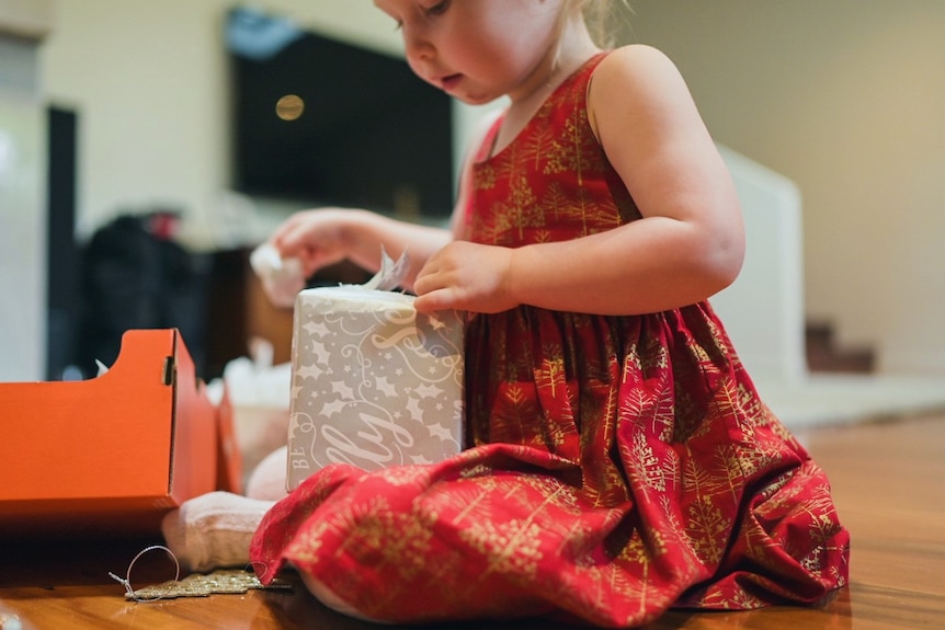 Opening presents on Christmas Day.