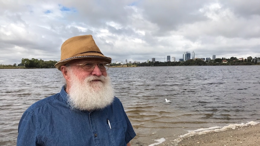John McLennan in front of the Perth skyline