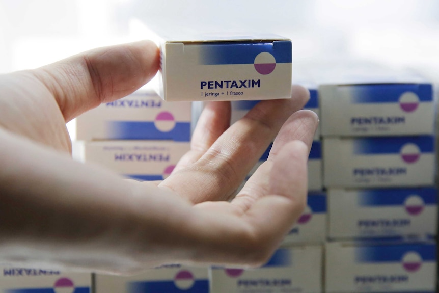 Boxes of Pentaxim vaccines for infants are stacked at a children's clinic