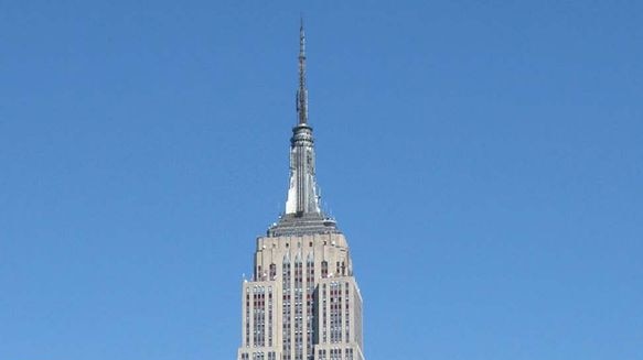 The Empire State Building towers over surrounding buildings in New York City