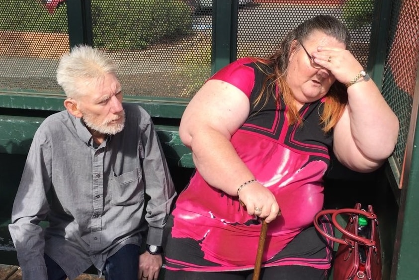 Anthony and Wendy Cable at a bus stop