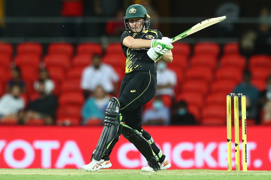 An Australia batter plays a pull shot against India.