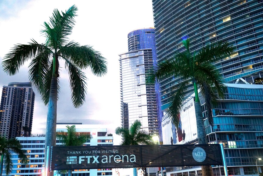 FTX signage in front of palm trees