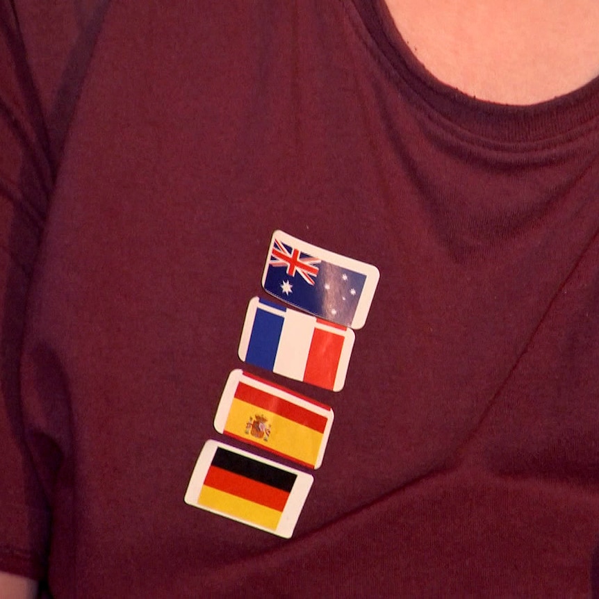 A shirt with stickers of flags