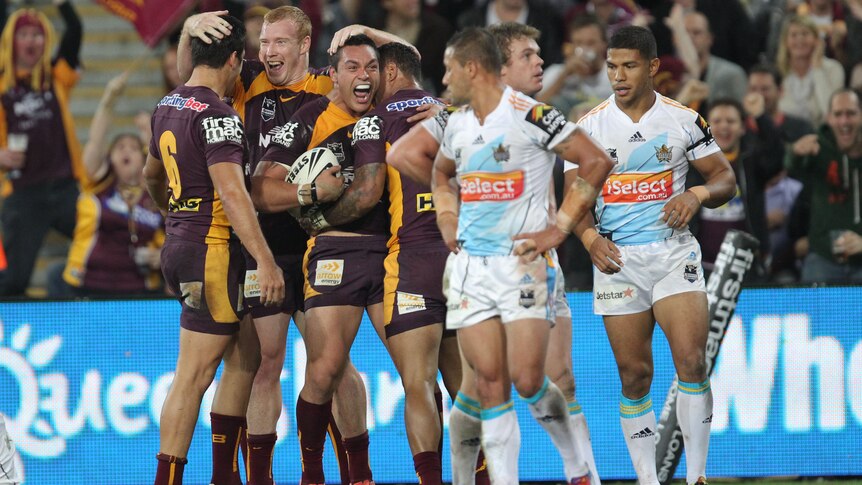 Pleasure and pain ... the Broncos crushed local rivals the Titans